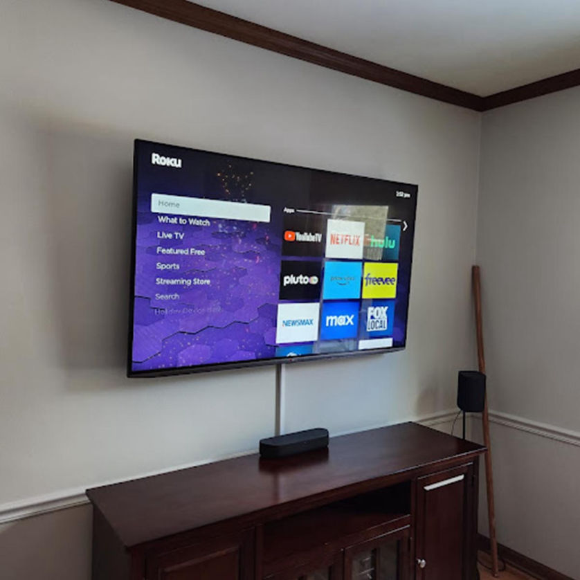 TV mounted over a fireplace