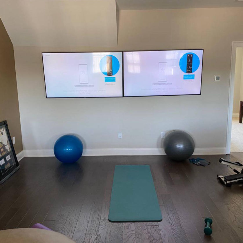 Image of a mounted TV in a living room.